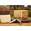 Aged Manchego Cheese Half Wheel (1.5kg) 5 Aged Manchego Cheese wheel partially sliced