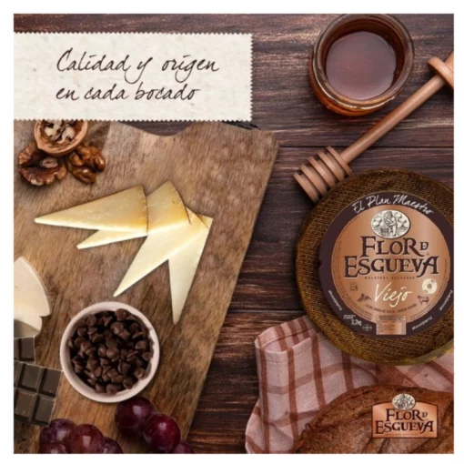 Flor de esgueva Spanish aged sheep milk cheese on cheese board with charcuterie