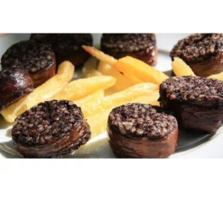 Sotopalacios Burgos blood sausage displayed on plate with chips