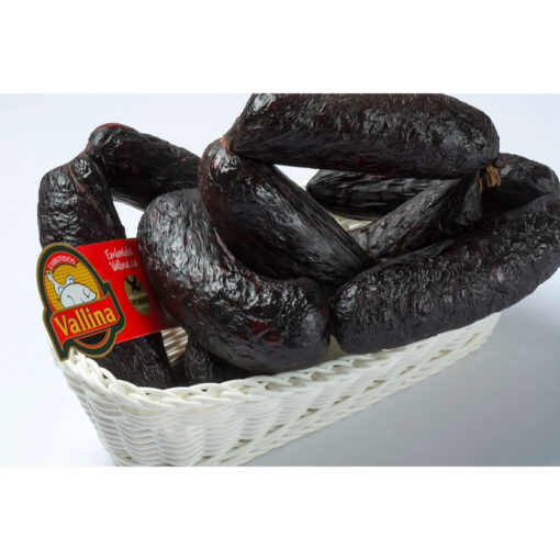 Whole Asturian morcilla in a white basket