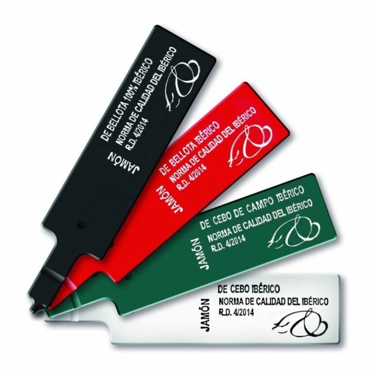 black, red, green and white labels for categorising Iberian hams