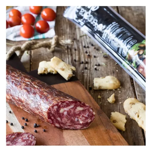 premium quality iberian chorizo on a board with tomatoes