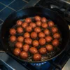 Palcarsa mini chorizos frying on pan