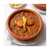 Bowl of cooked spanish lentils dish with chorizo