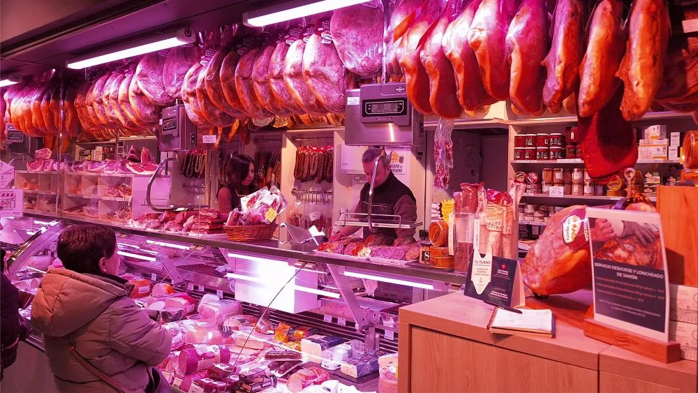 People queuing in a spanish charcuterie
