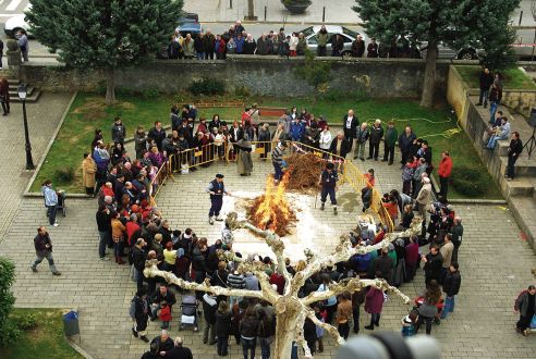 Villagers smoking a pig during la matanza Burgos, Spain