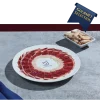 Cinco Jotas Iberian Ham Shoulder slcied on presented on plate