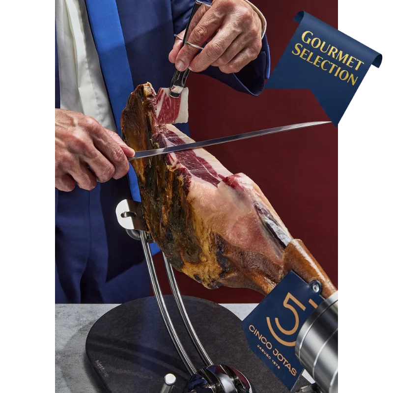 (5J) Cinco Jotas Jamon Iberico Ham Shoulder (5.2Kg) 3 Cinco Jotas Iberian Bellota Ham Shoulder being carved