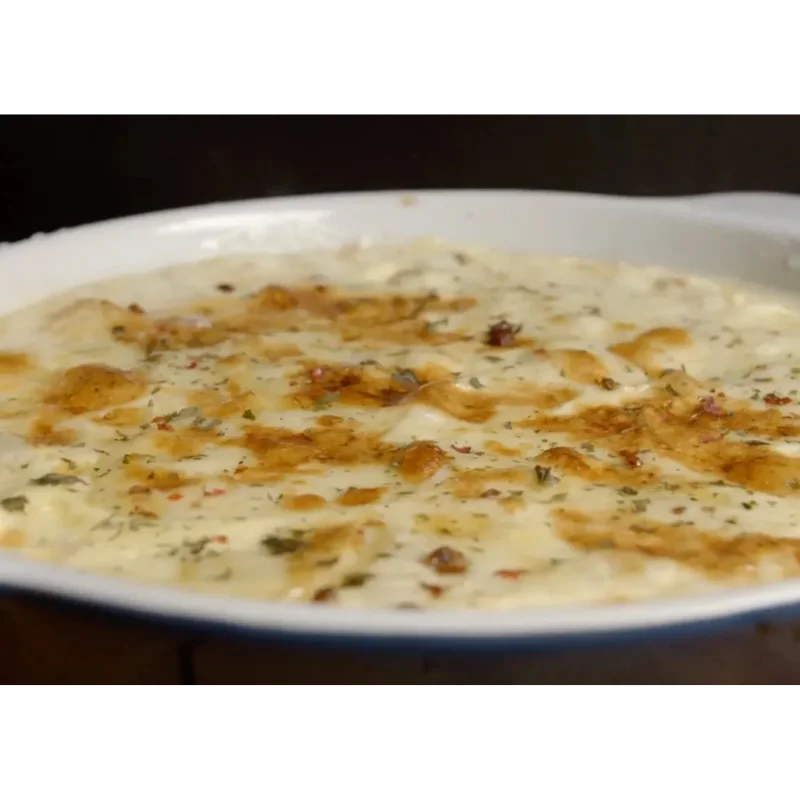 Melting Cheese: Prieto Tetilla PDO (750g) 2 Melting Cheese: Prieto Tetilla PDO melted in a casserole dish