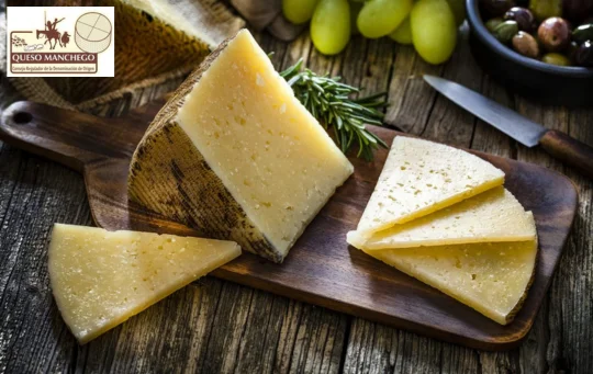 Manchego Cheeses sliced on board - buy manchego cheese online in Ireland